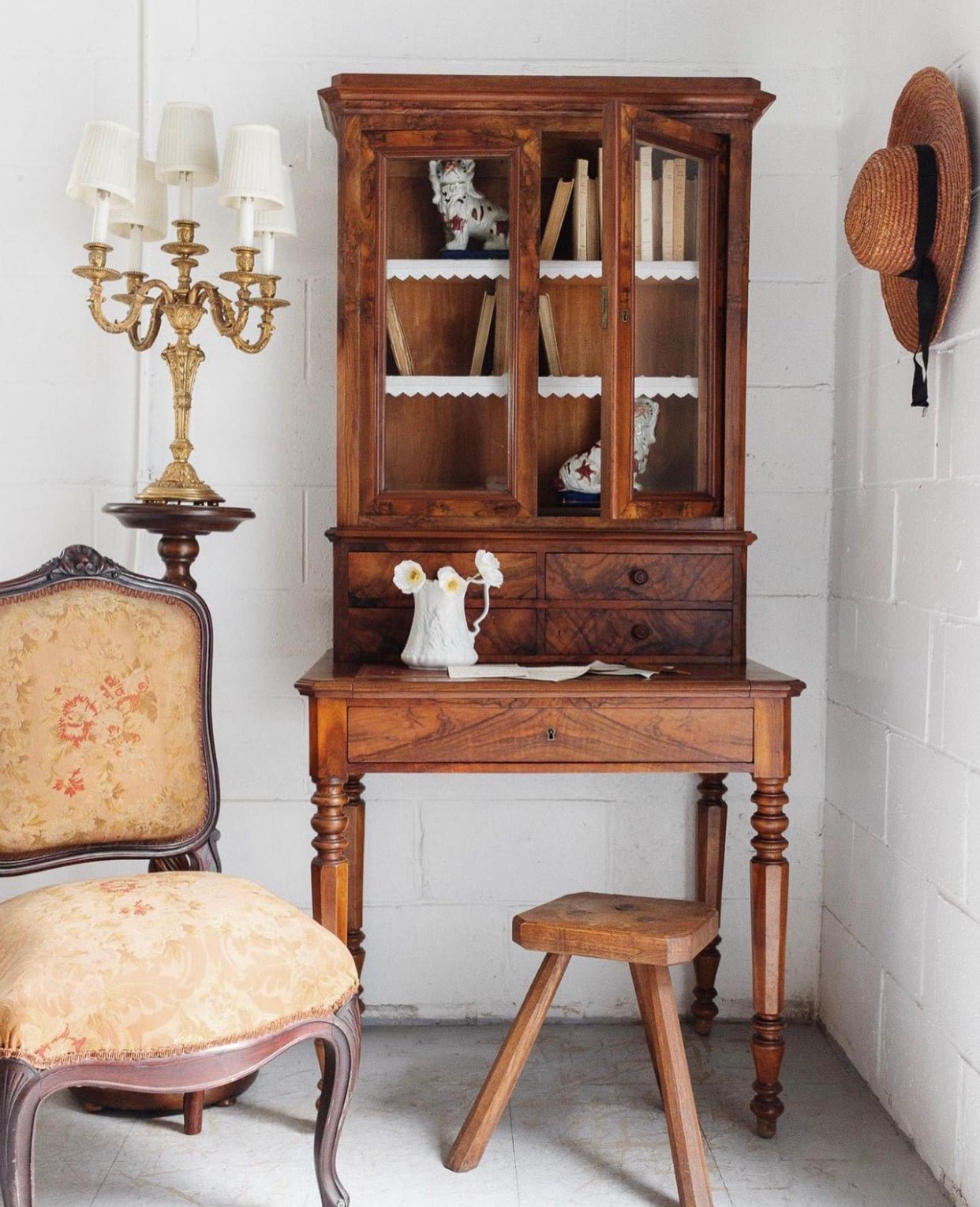 Antique European furniture including French farmhouse tables, vintage armoires, and classic chairs from France, Belgium, and Germany.