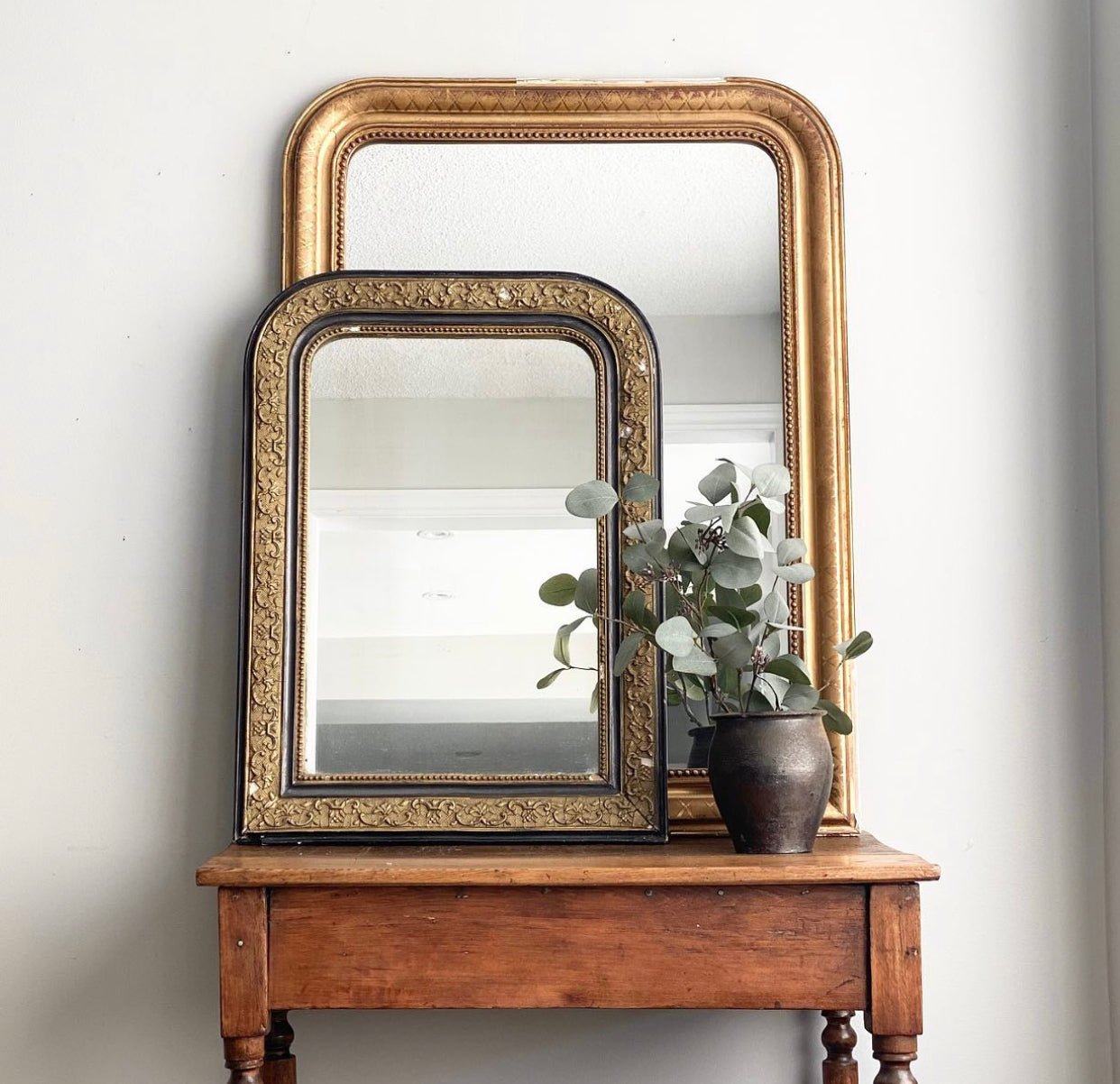 Vintage and antique mirrors with unique frames sourced from brocantes and markets.