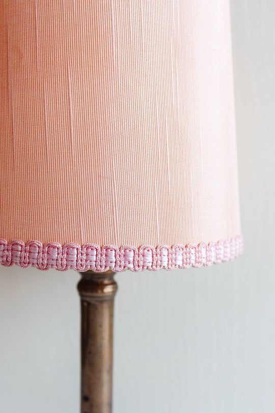 pair of antique French brass candlestick lamps with midcentury shades