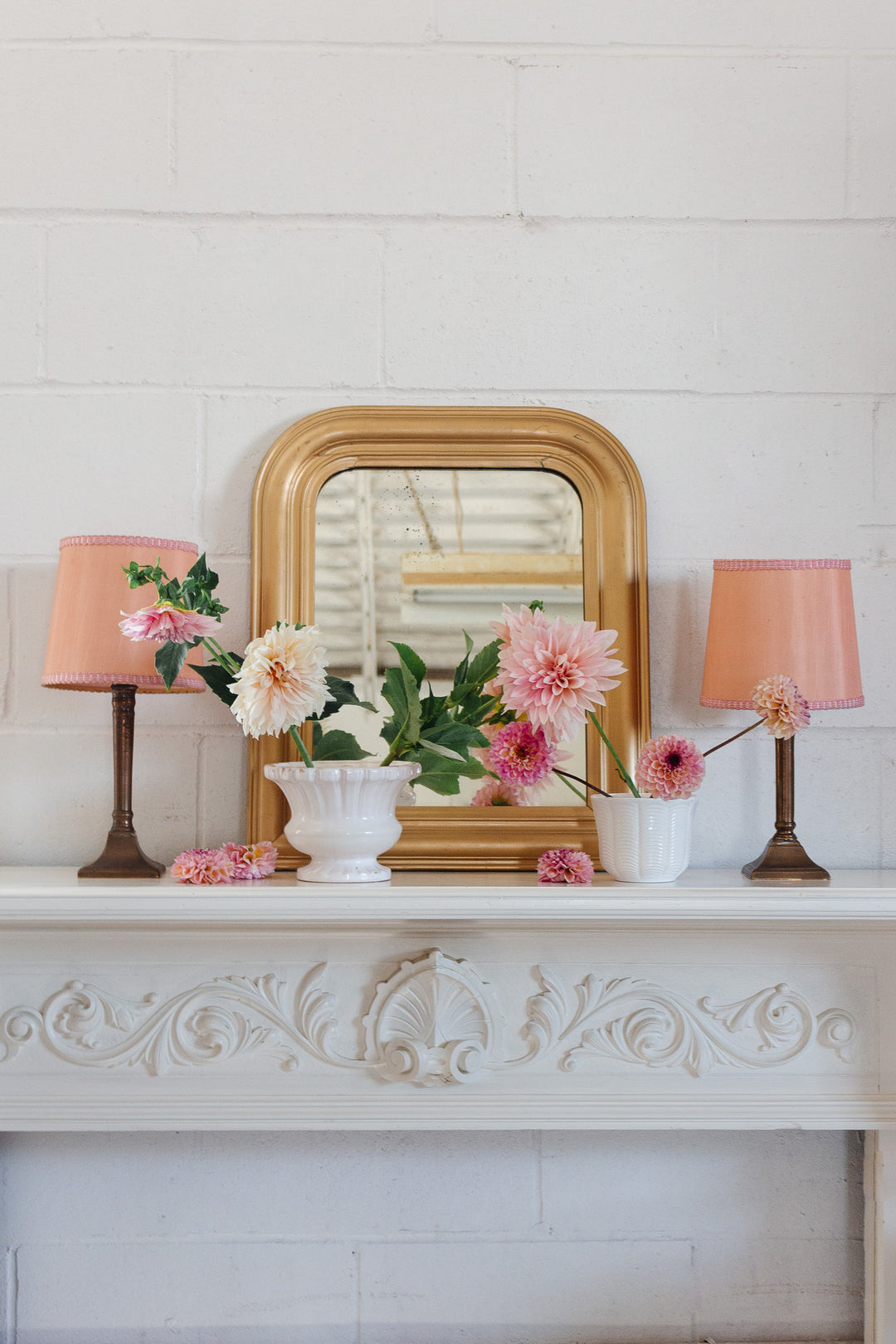 pair of antique French brass candlestick lamps with midcentury shades