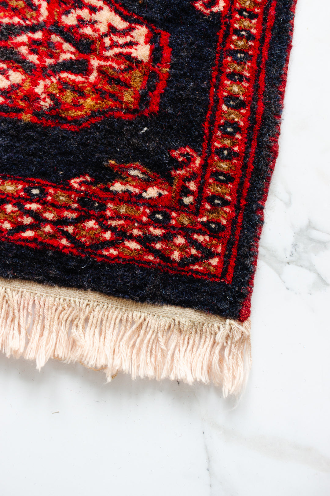 vintage Persian placemat sized rug, navy and red