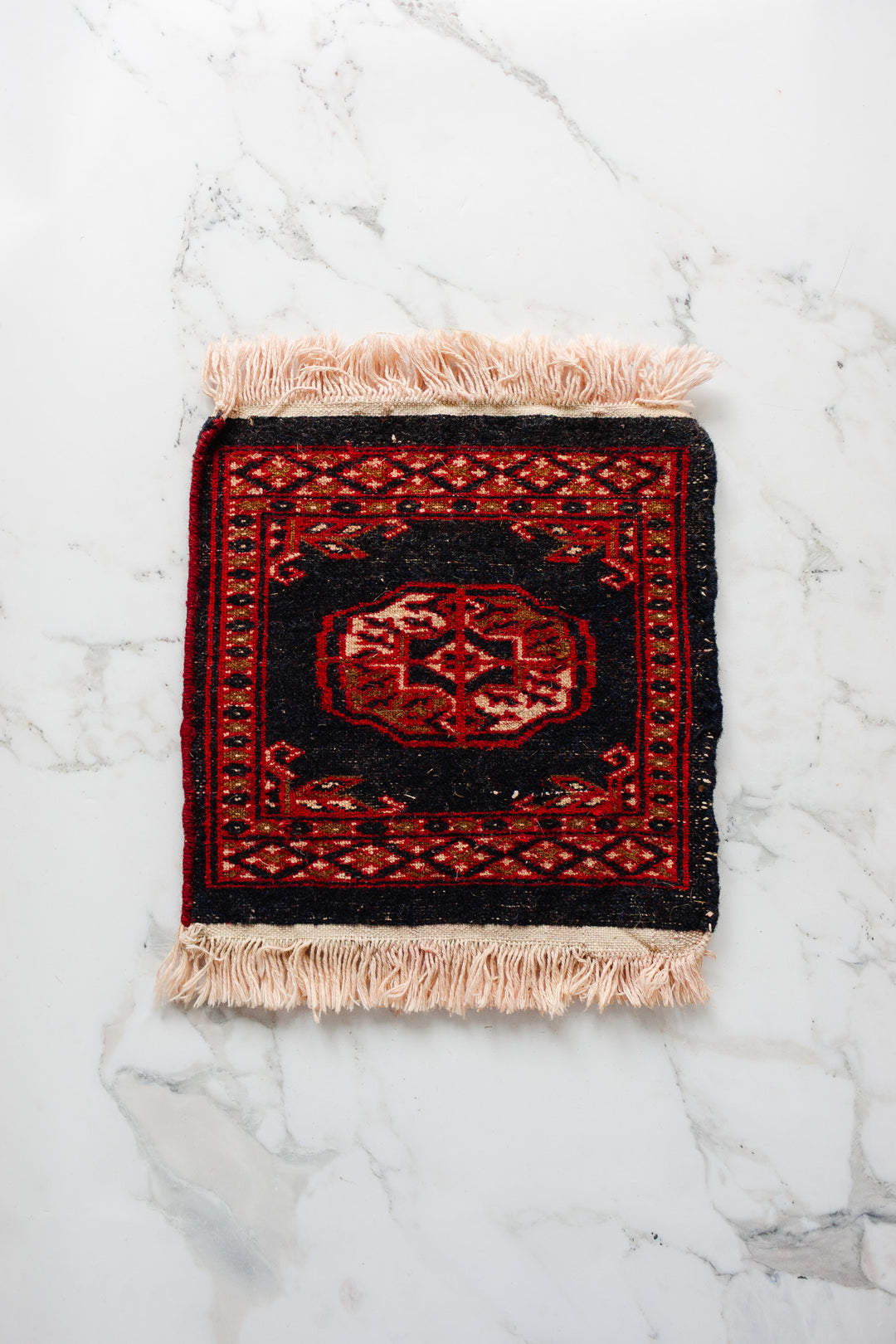 vintage Persian placemat sized rug, navy and red