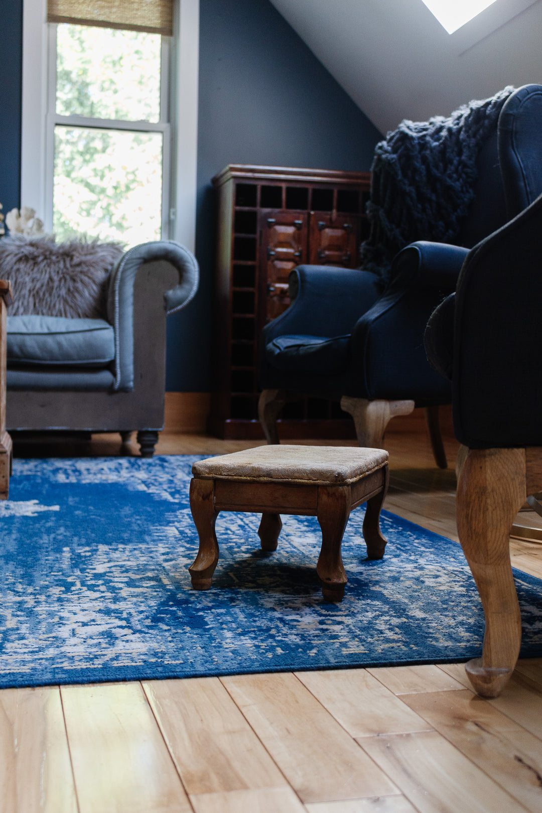 antique english upholstered carbriole foot stool