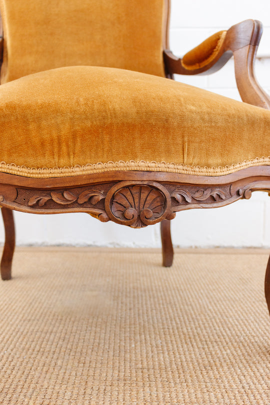 19th century Louis XV carved walnut and velvet armchair
