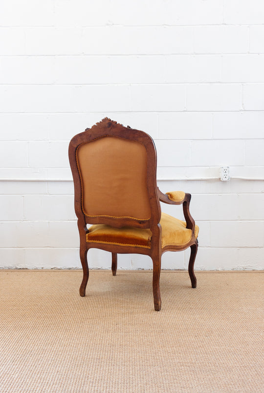 19th century Louis XV carved walnut and velvet armchair