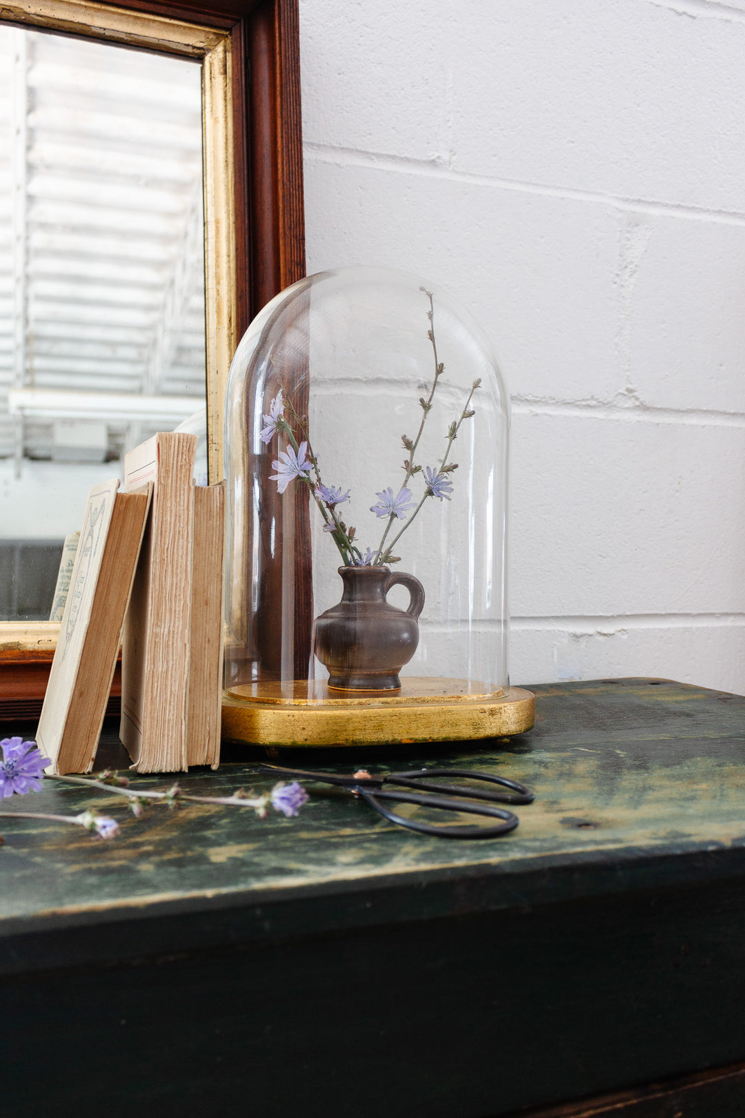 19th century French “globe de Mariée” glass cloche & gilt wood base
