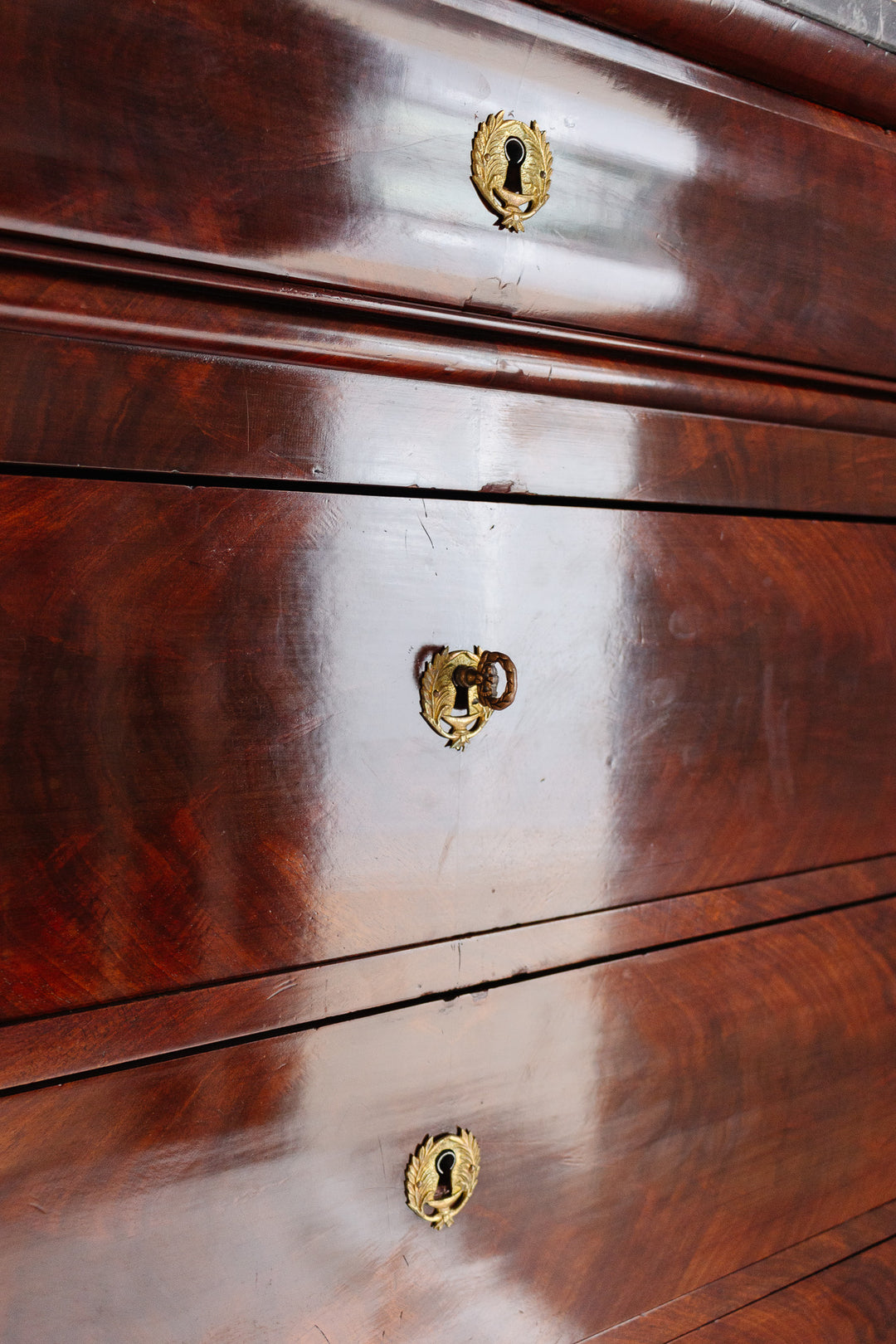 19th century flamed mahogany French Louis Philippe tall boy cabinet