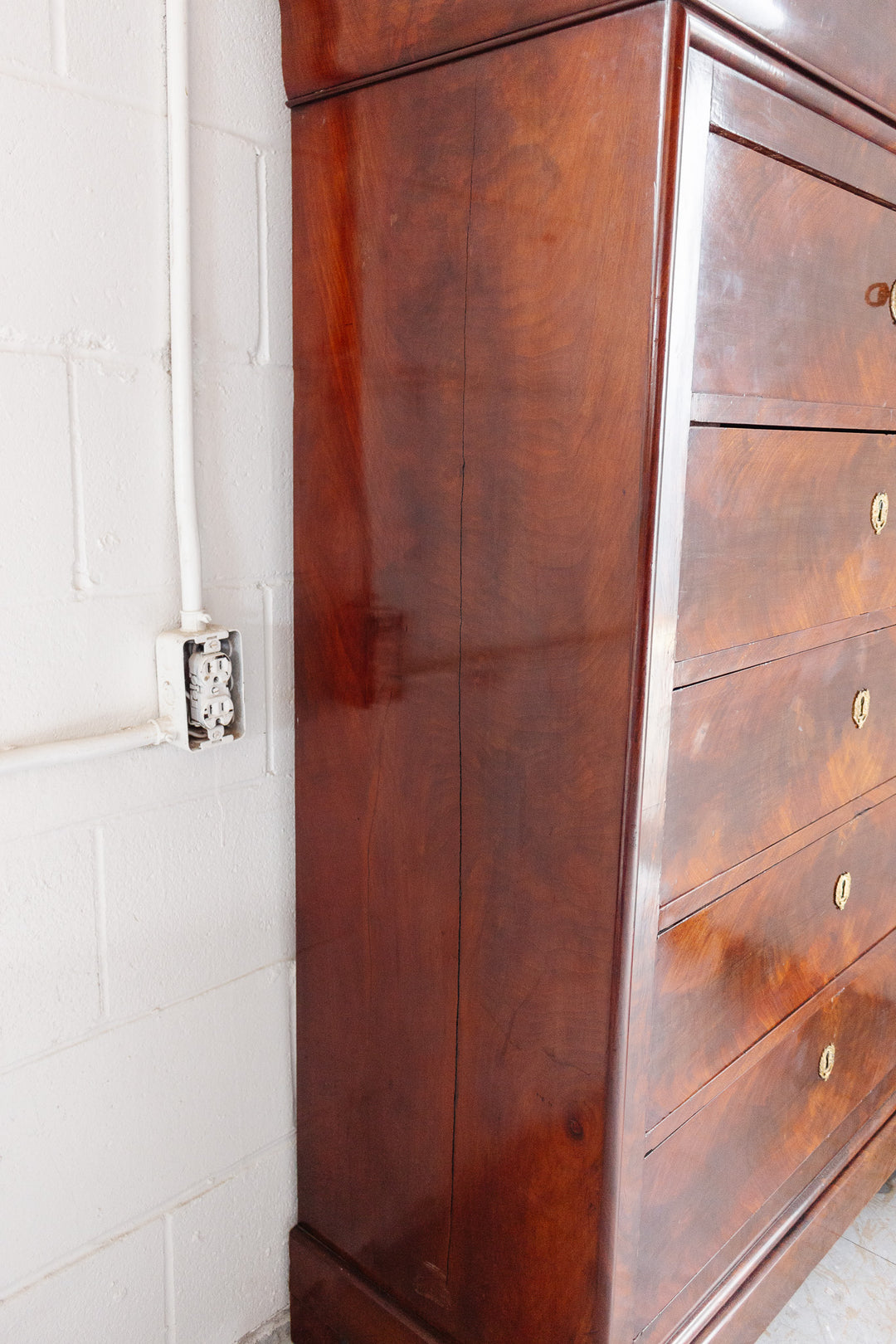19th century flamed mahogany French Louis Philippe tall boy cabinet