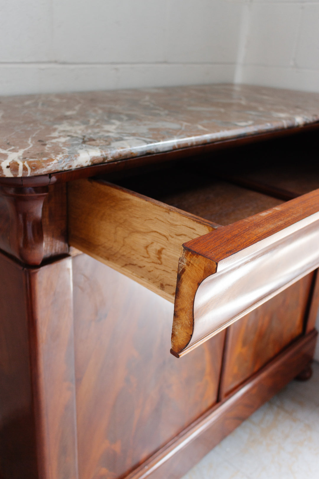 19th century French Louis Philippe flame mahogany and marble top side board