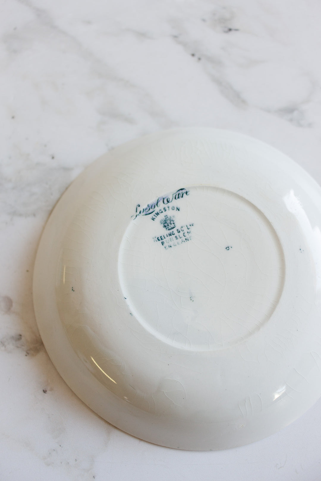 antique blue and white teacup and saucer by keeling & co ltd