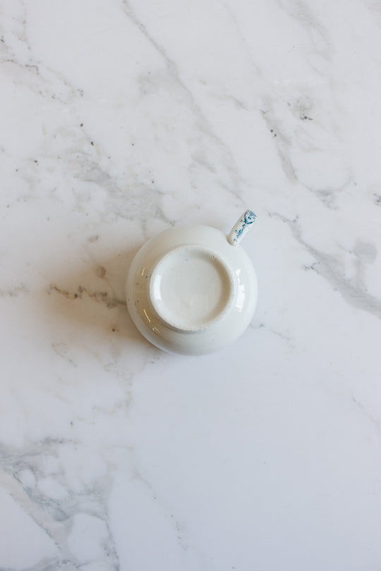 antique blue and white teacup and saucer by keeling & co ltd