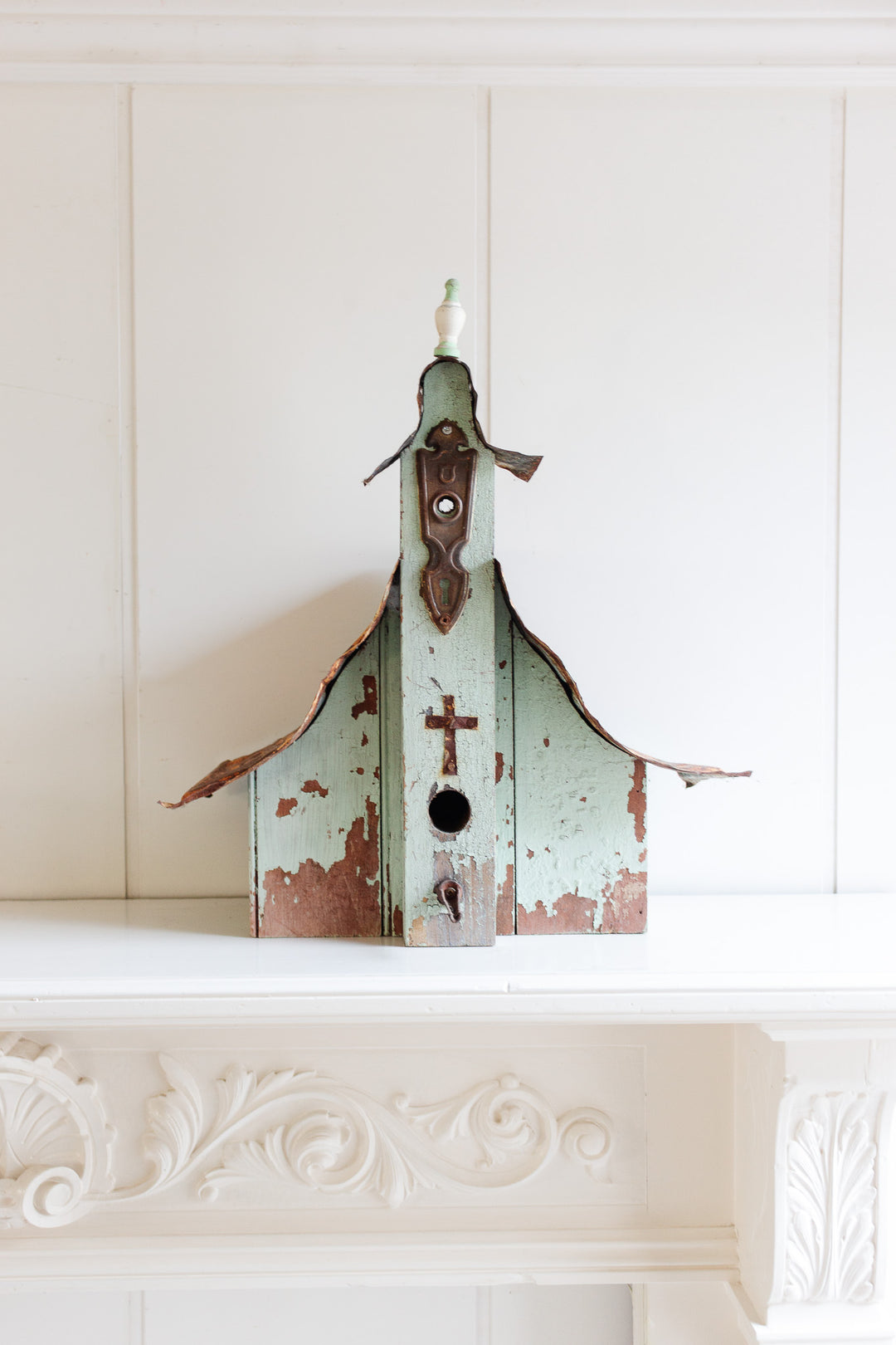 antique European wooden bird house with tin roof