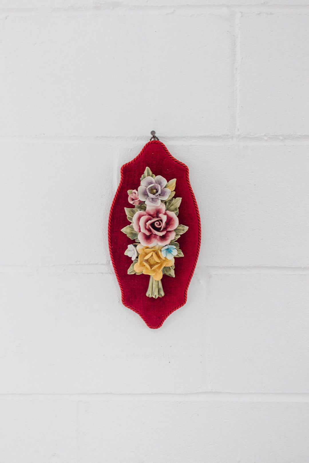 vintage Italian Capodimonte porcelain flowers on velvet