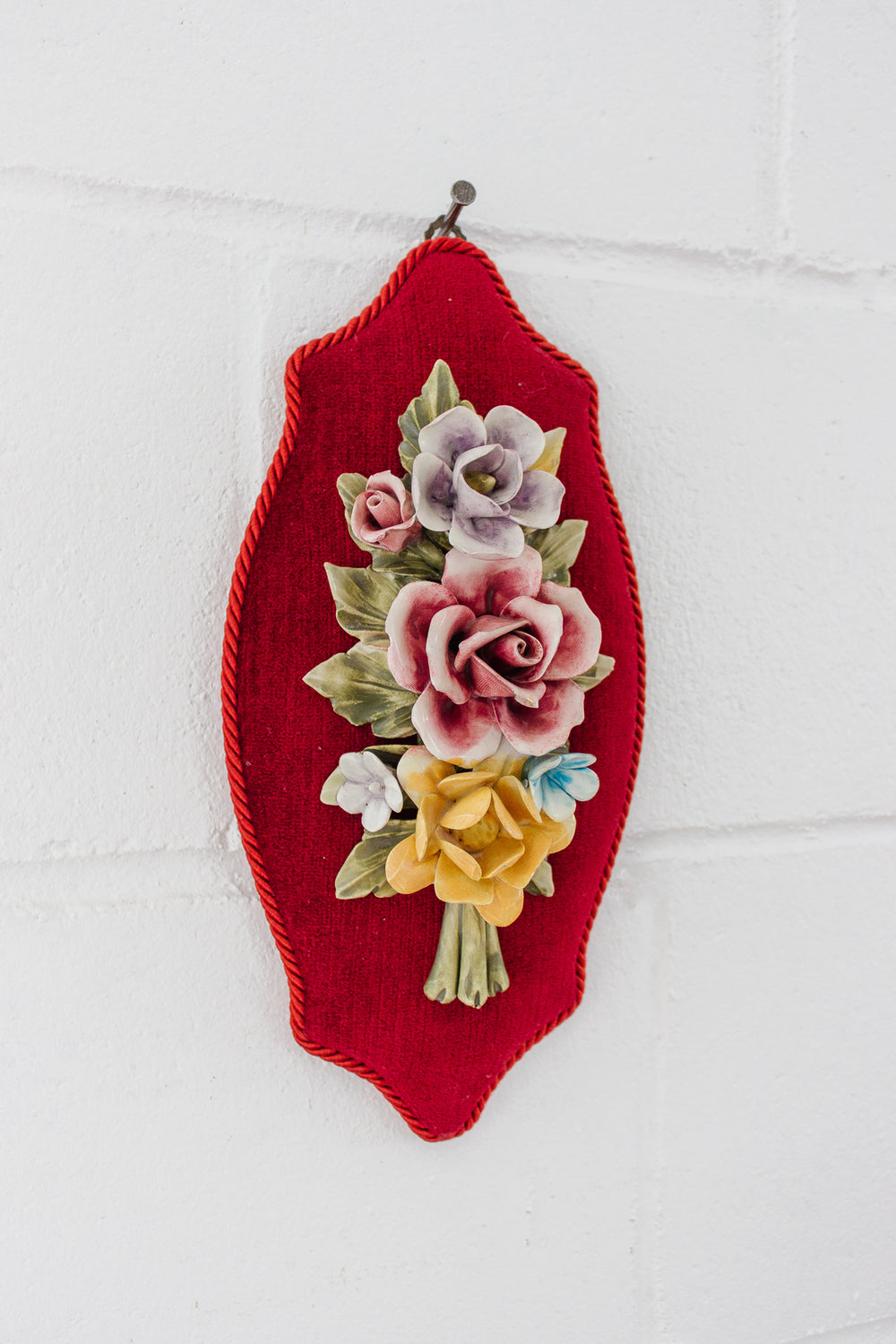 vintage Italian Capodimonte porcelain flowers on velvet