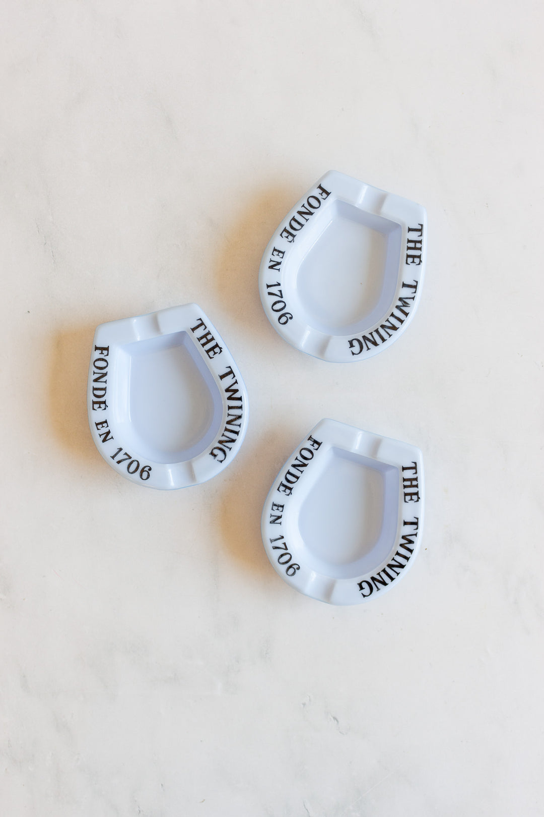 1970s french thé twining horseshoe milk glass ashtray