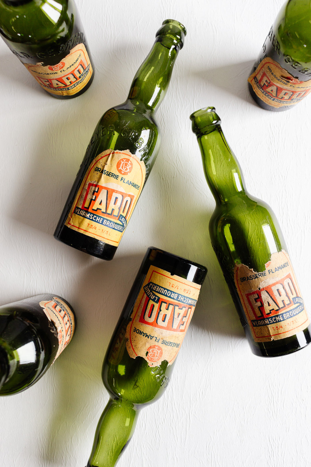 vintage Belgian "faro" embossed glass beer bottle