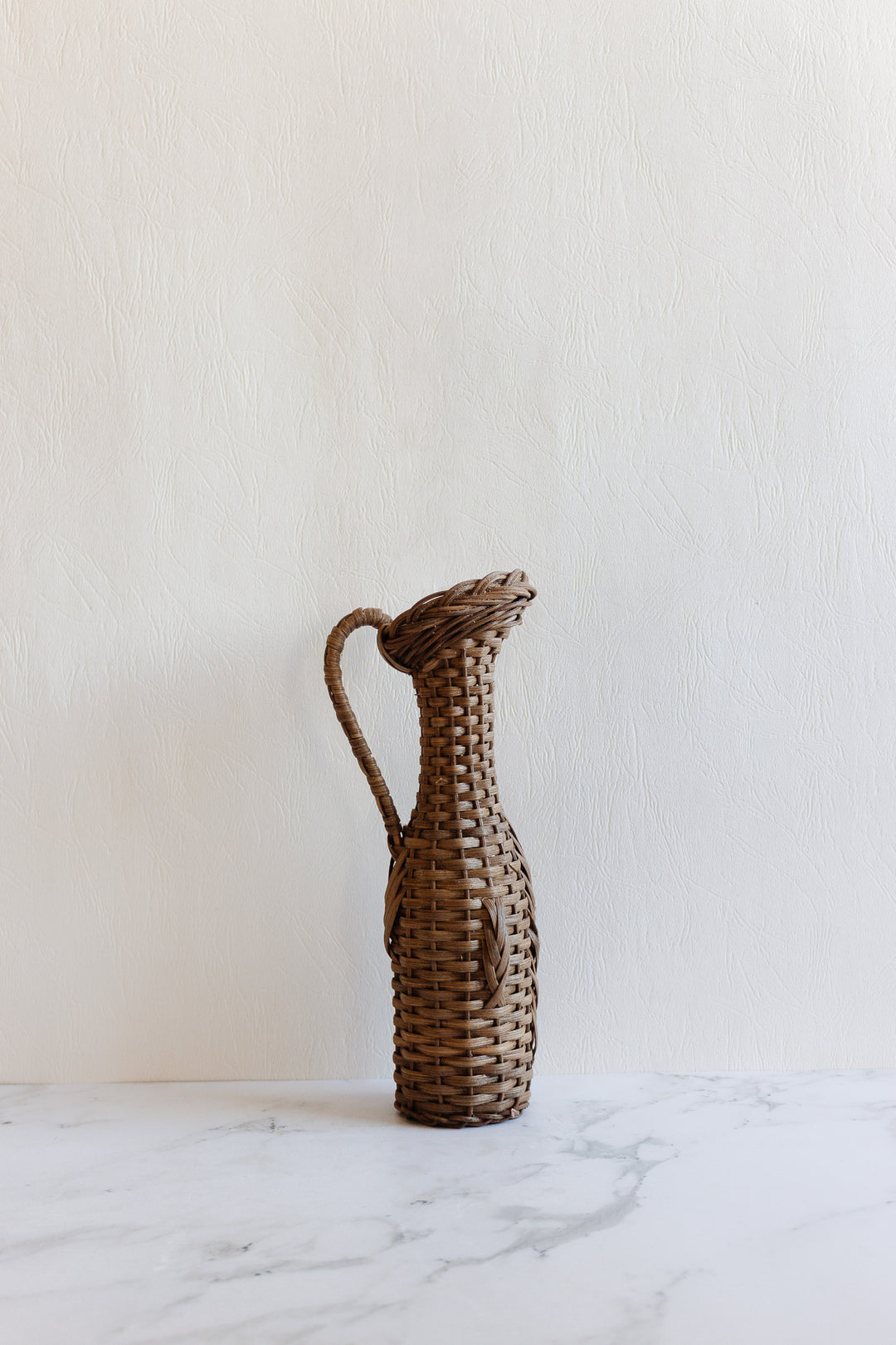 vintage french wicker wrapped bottle