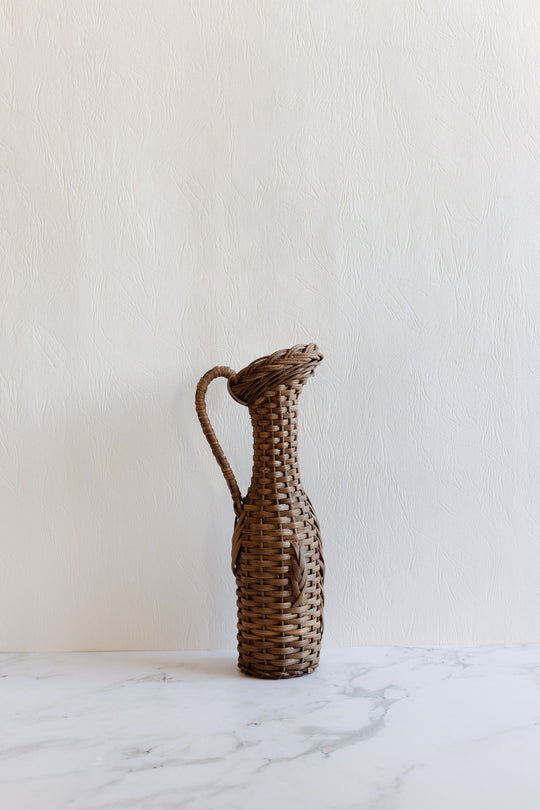vintage french wicker wrapped bottle