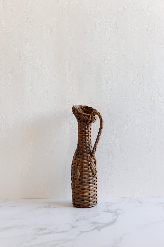 vintage french wicker wrapped bottle