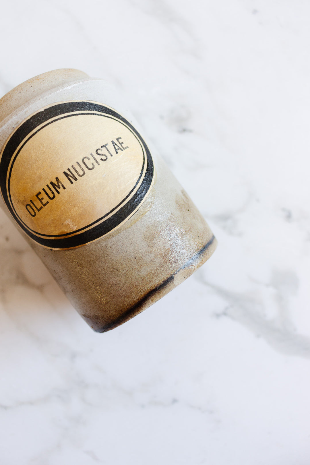 antique "oleum nucistae" stoneware apothecary jar