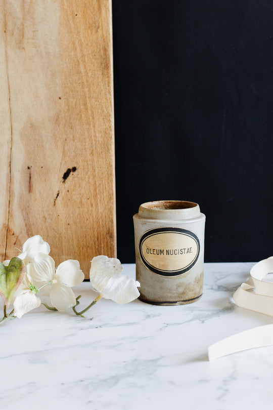 antique "oleum nucistae" stoneware apothecary jar