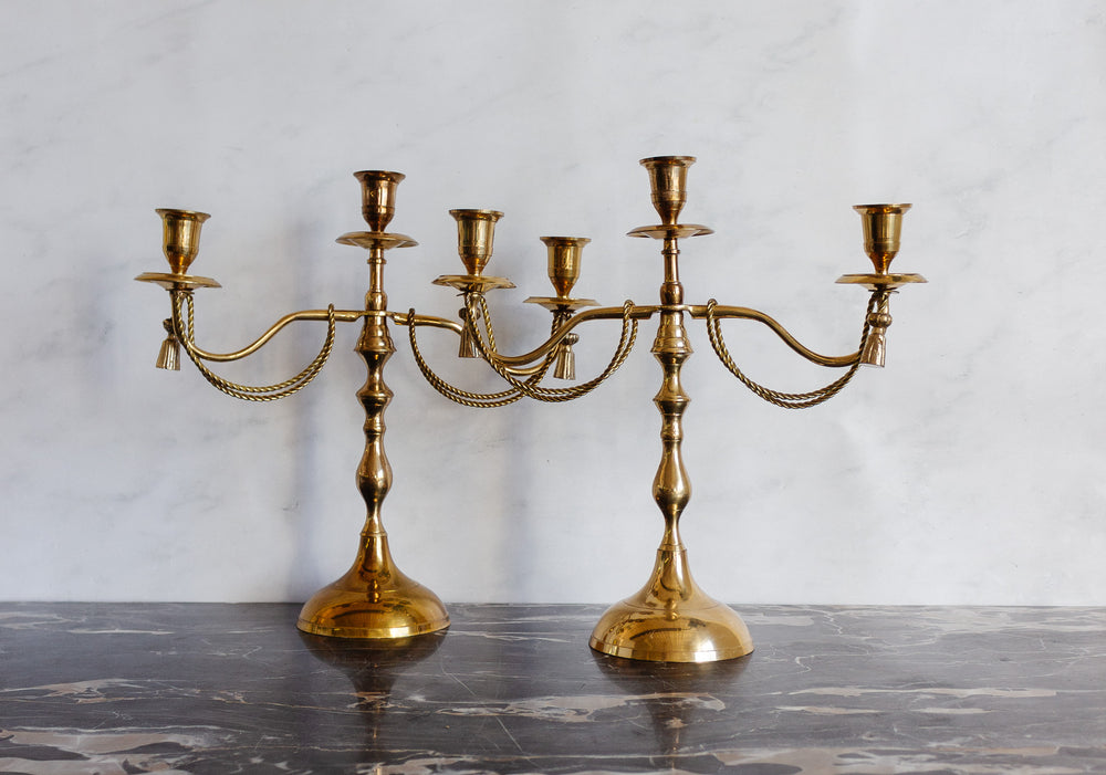 pair of vintage french candelabras with brass rope and tassels