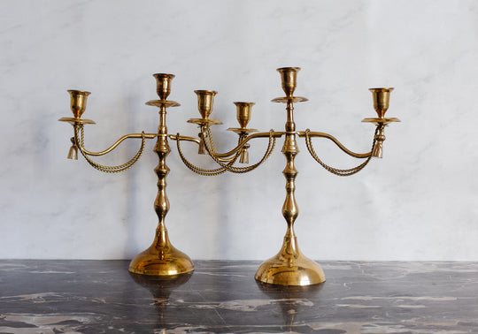 pair of vintage french candelabras with brass rope and tassels