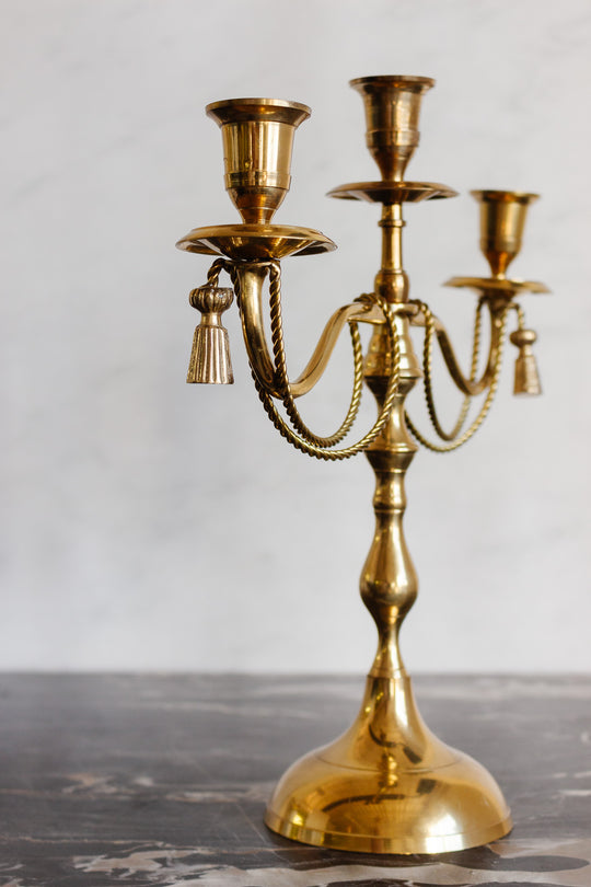pair of vintage french candelabras with brass rope and tassels