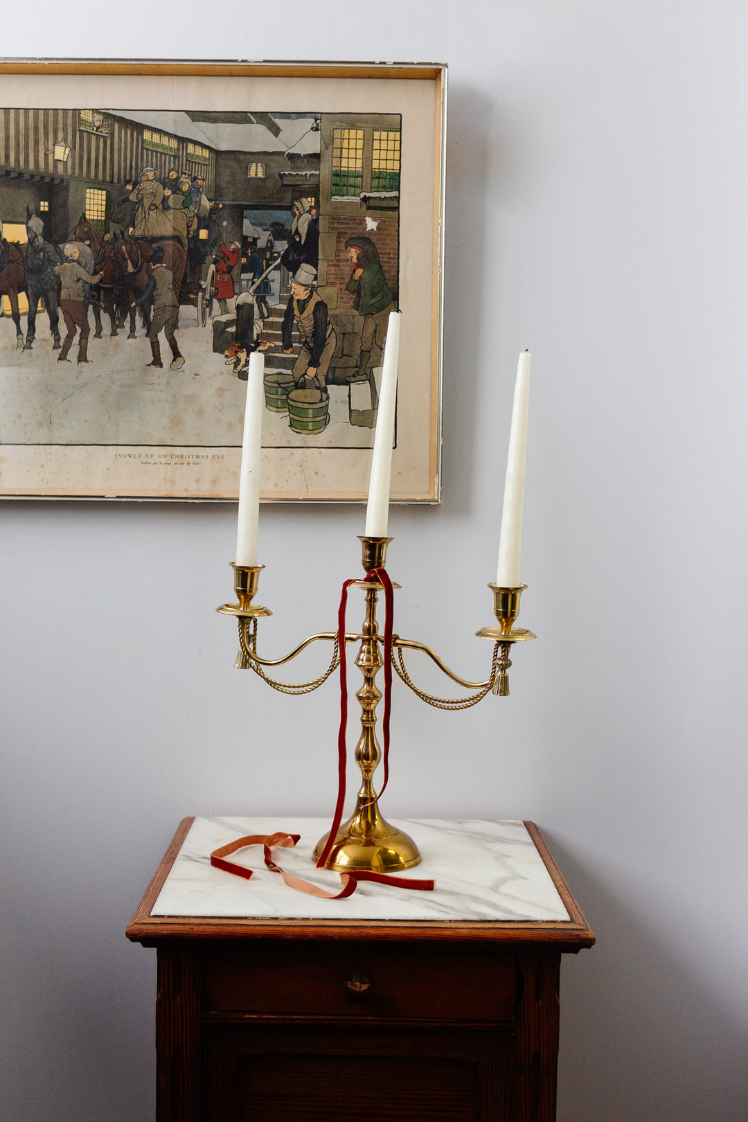 pair of vintage french candelabras with brass rope and tassels