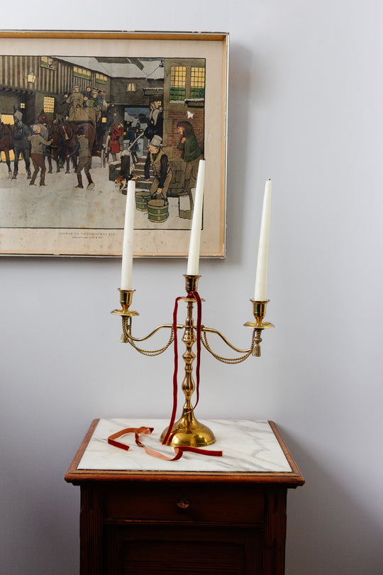 pair of vintage french candelabras with brass rope and tassels