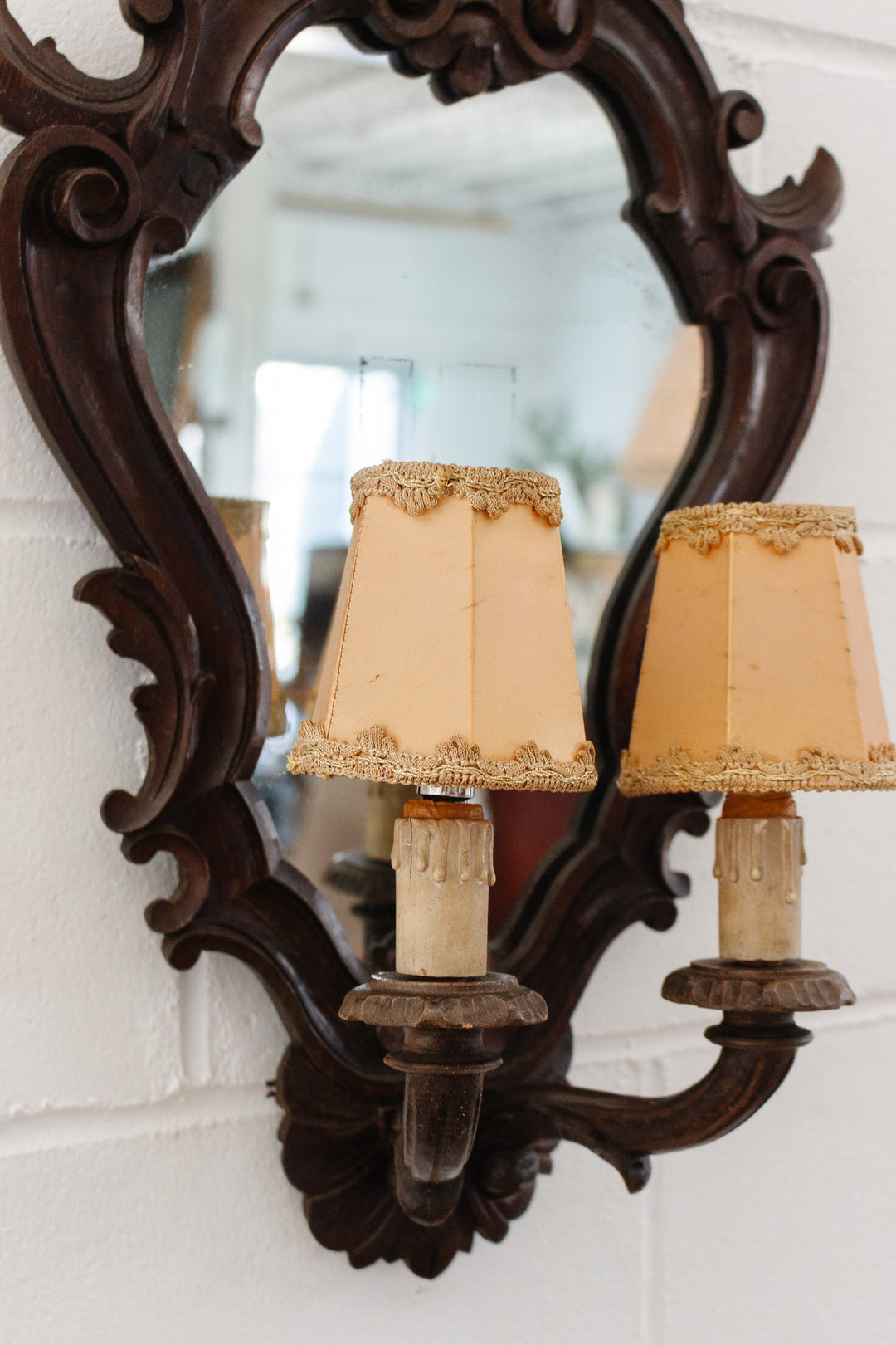 1920s French carved wood rococo style mirror sconce