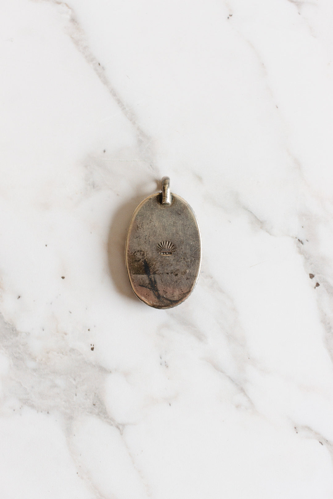 stamped English antique sterling silver and scrimshaw pendant