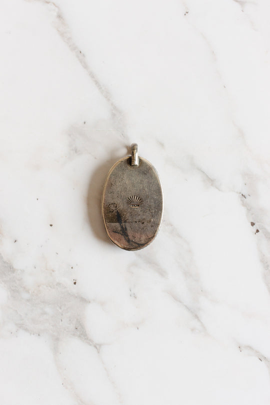 stamped English antique sterling silver and scrimshaw pendant