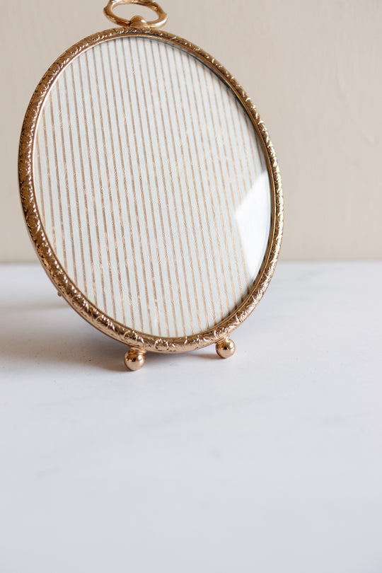 antique 24k gold plated frame with convex glass
