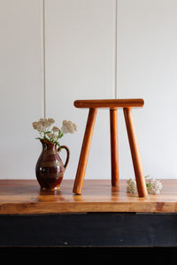 midcentury brutalist french half moon tripod stool