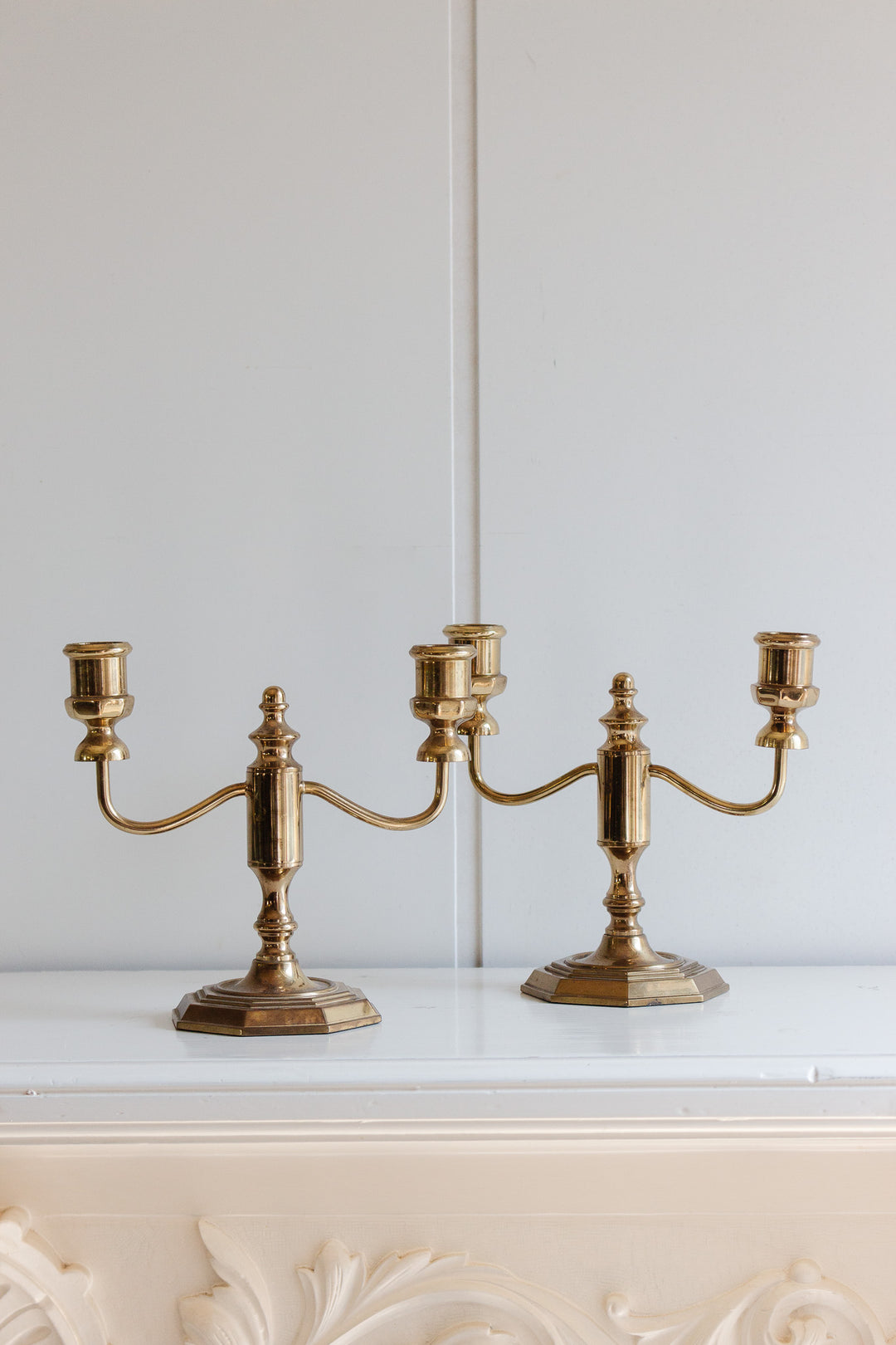 pair of antique french brass candelabras