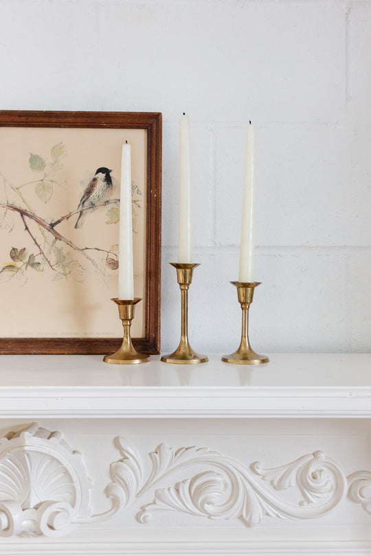 trio of graduated vintage french brass candlesticks