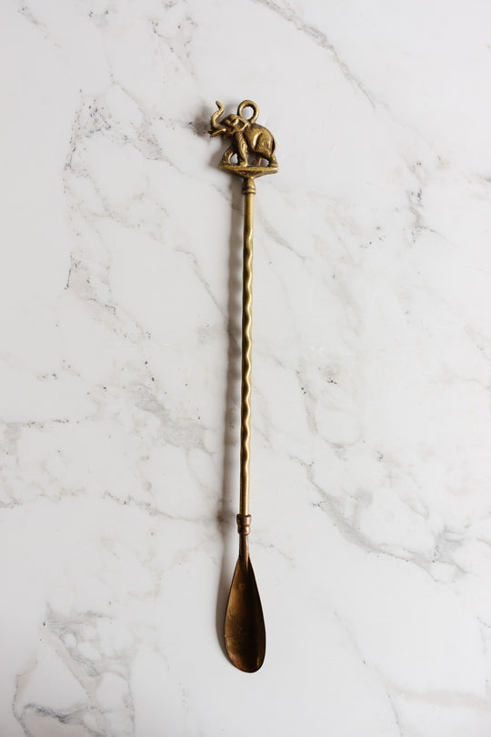antique brass shoe horn: elephant or horse
