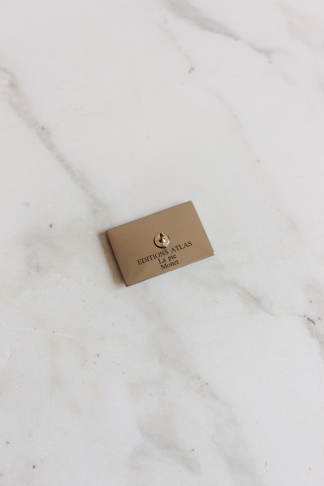 pair of vintage french éditions atlas art pins