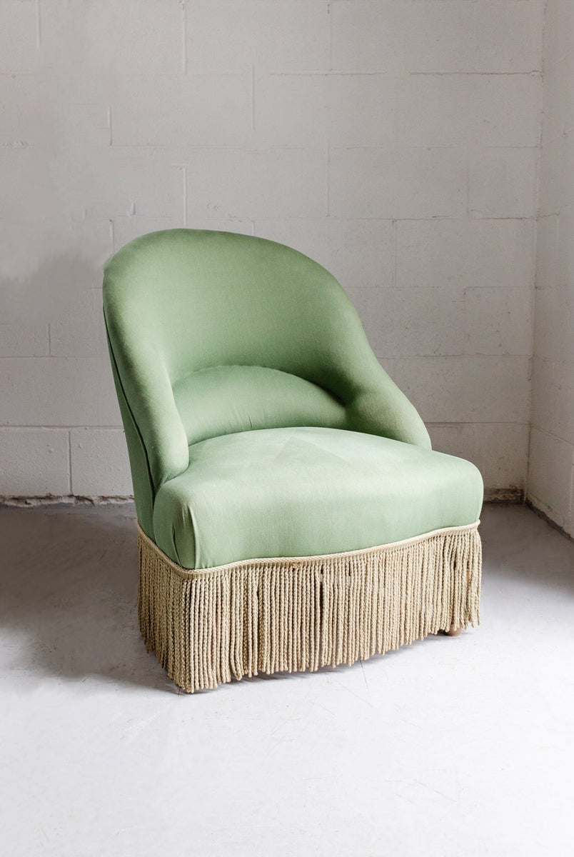 vintage french emerald green crapaud chair with fringe Joliette