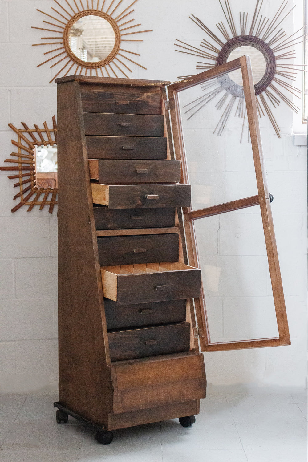 vintage glass front multidrawer cabinet
