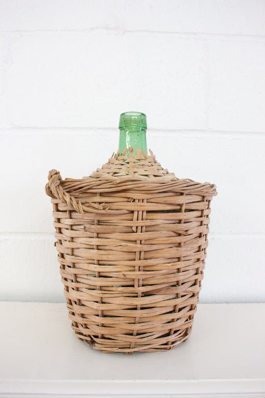 vintage french wicker wrapped demijohn