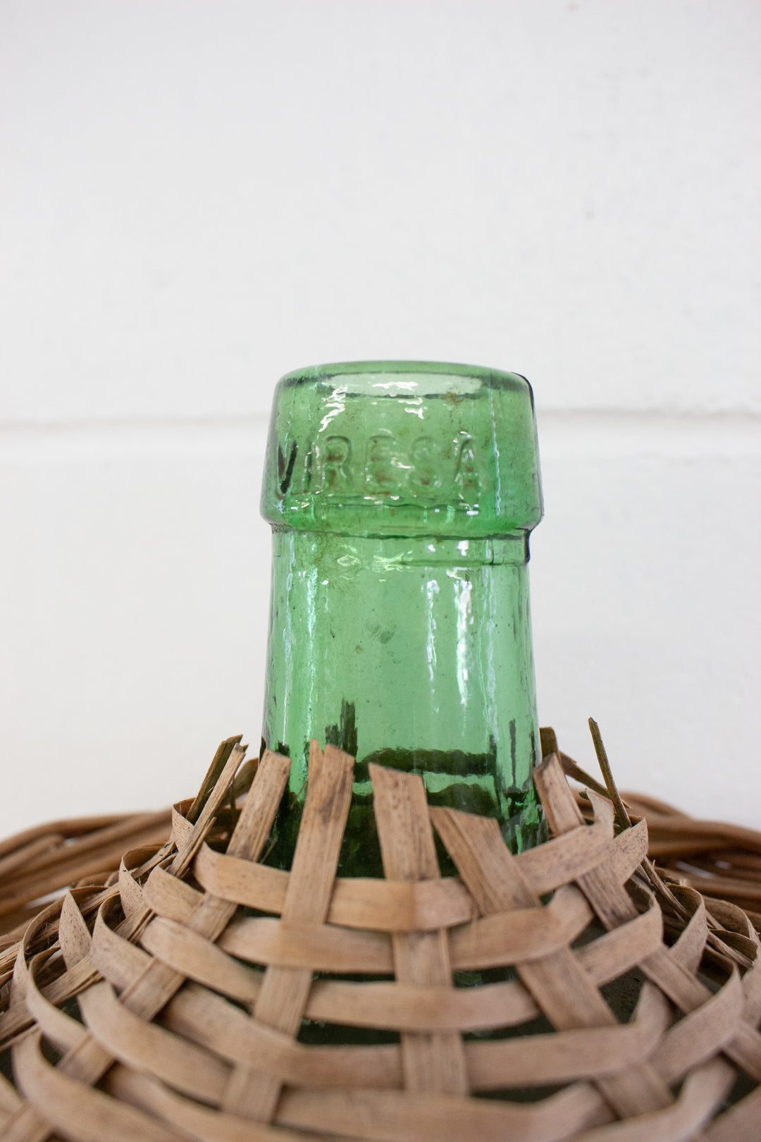 vintage french wicker wrapped demijohn