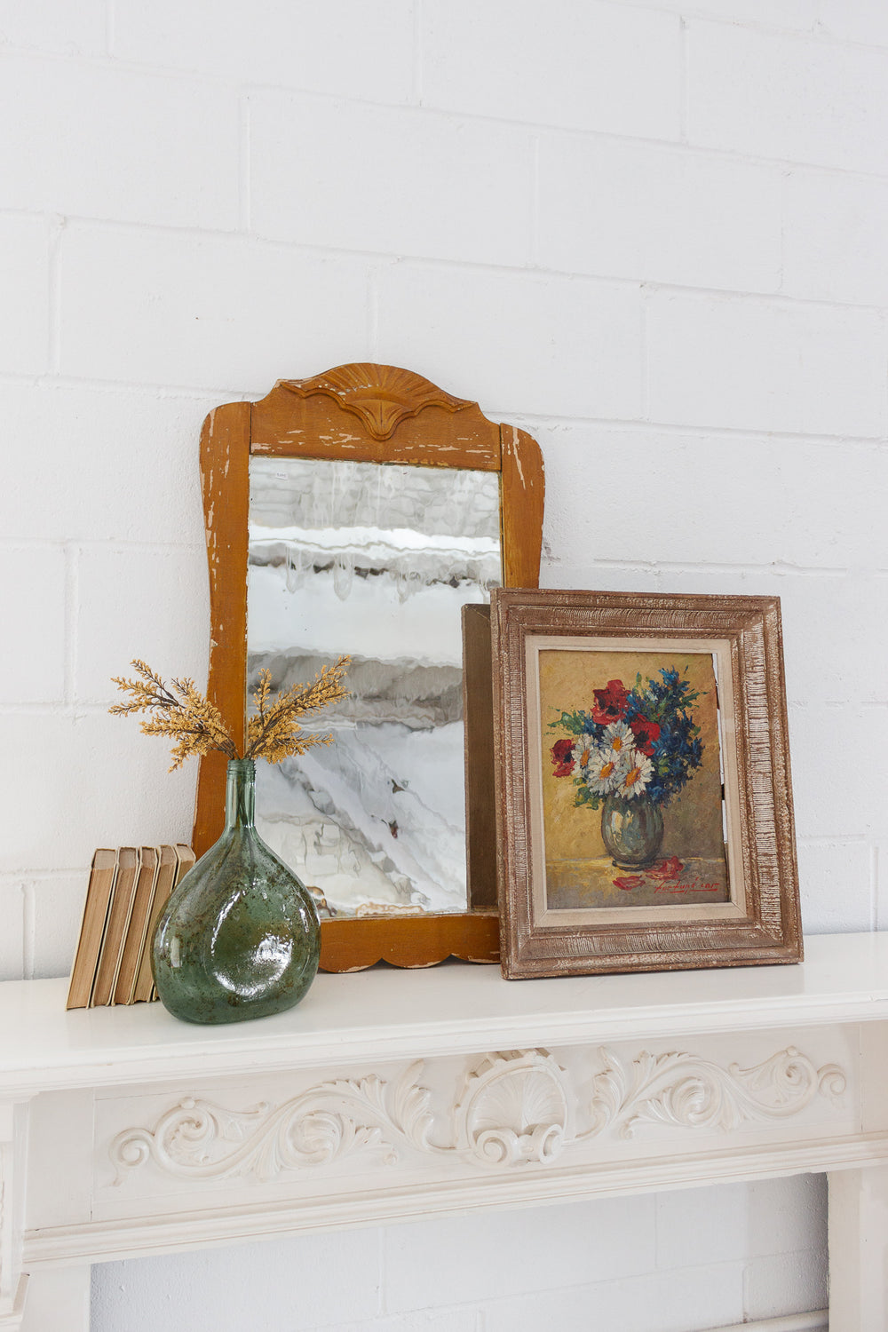 antique carved wood mirror with wavy glass