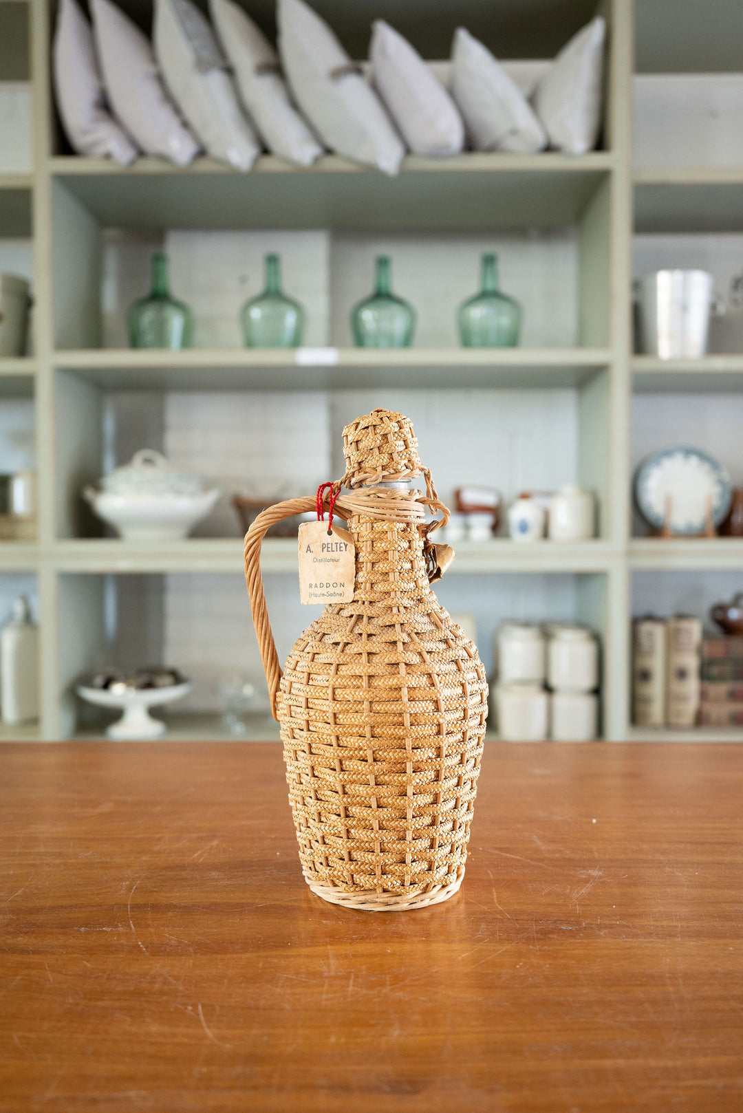 vintage french wicker wrapped demijohn