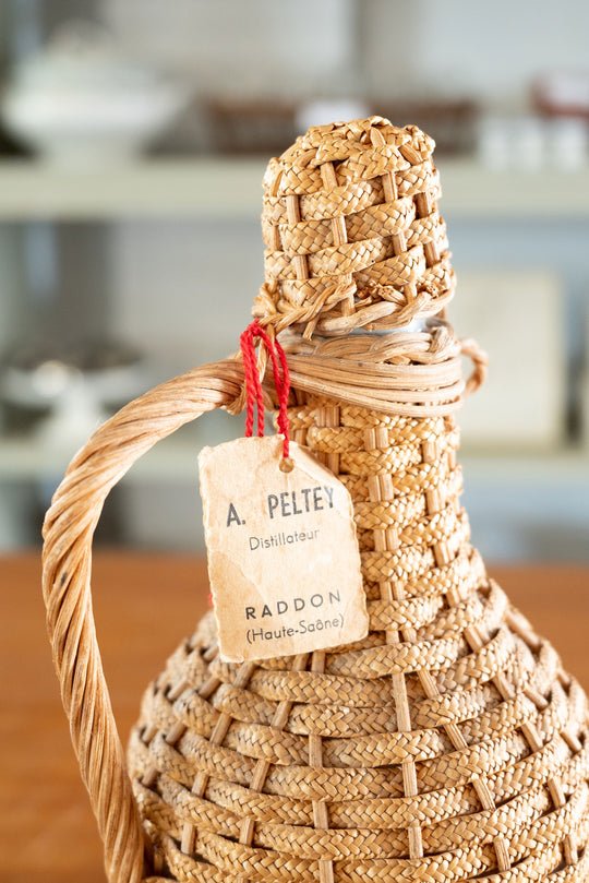 vintage french wicker wrapped demijohn
