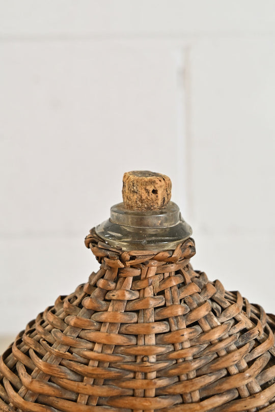 vintage french wicker wrapped demijohn