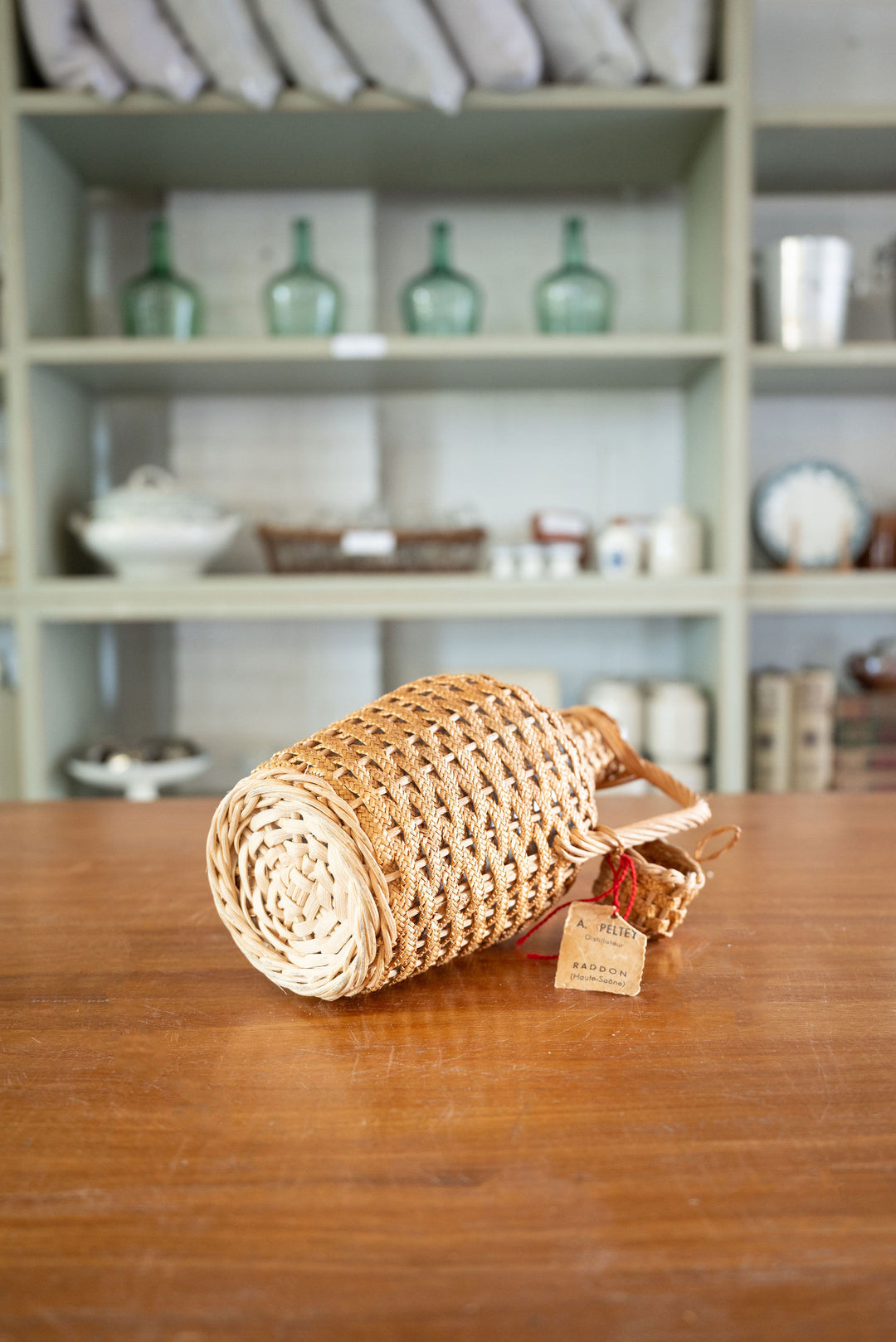 vintage french wicker wrapped demijohn