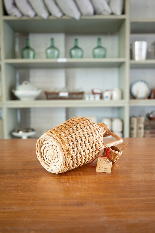 vintage french wicker wrapped demijohn