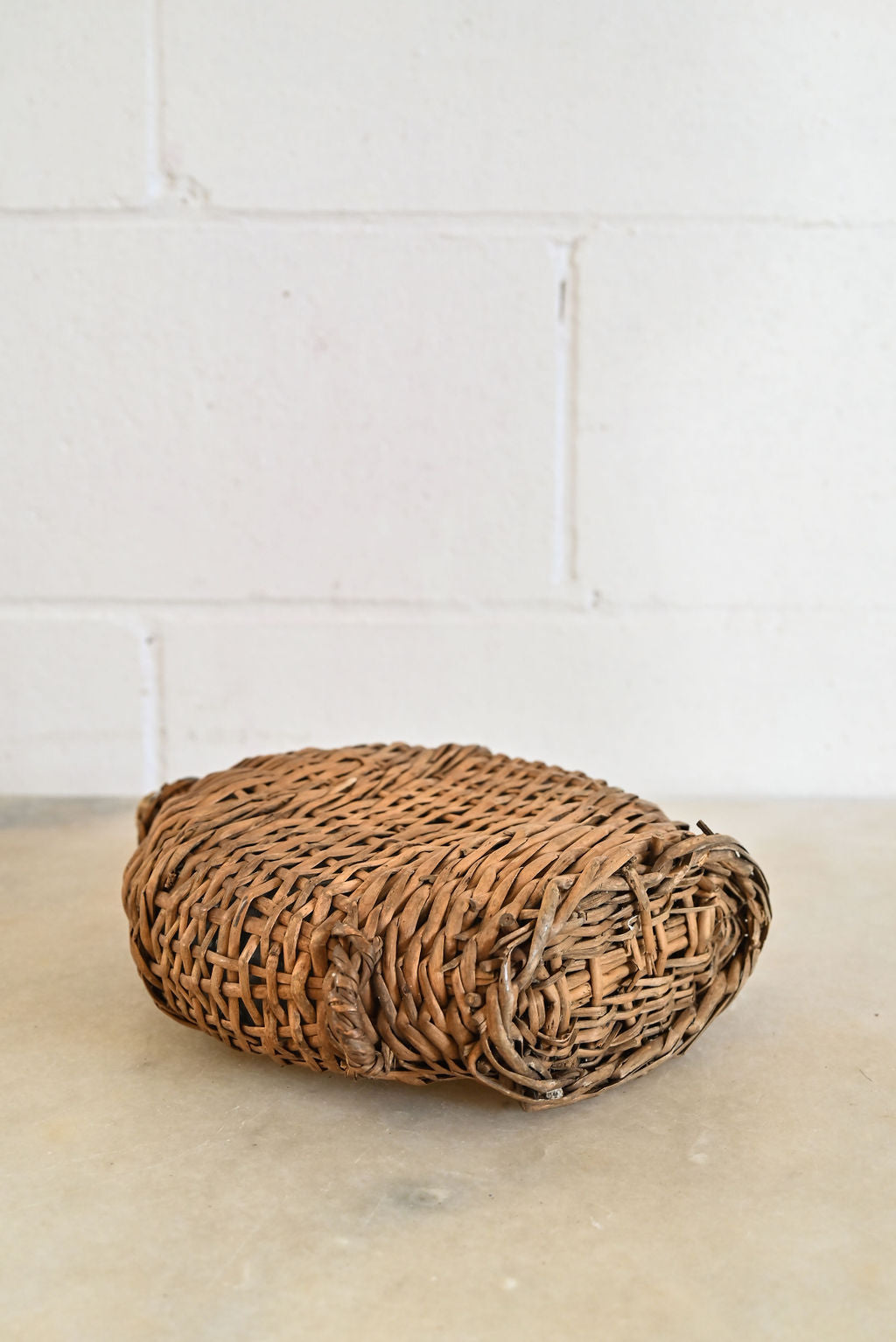 vintage french wicker wrapped demijohn